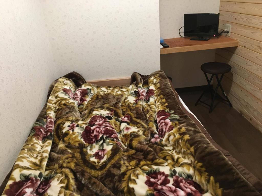 Postel nebo postele na pokoji v ubytování Ikkyu For Backpackers 19