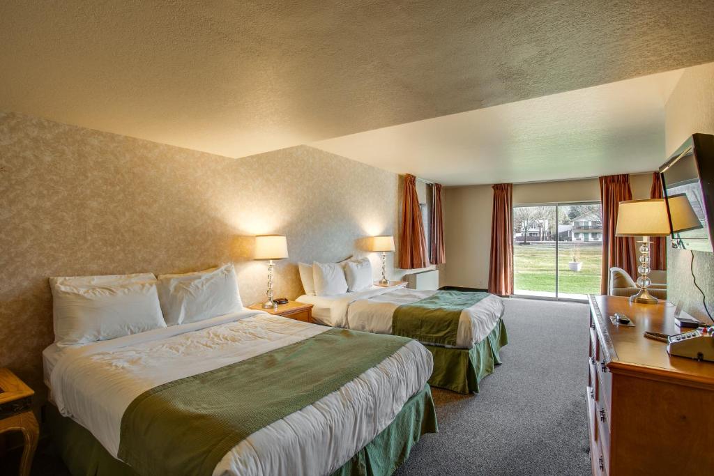 Postel nebo postele na pokoji v ubytování Der Ritterhof Inn