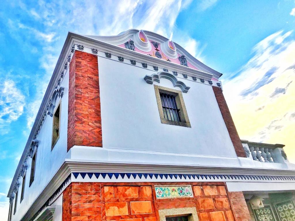 a tall building with a window on top of it at LuoFunJyu in Jincheng