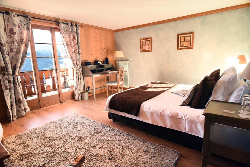 Postel nebo postele na pokoji v ubytování Chalet d'Adrien