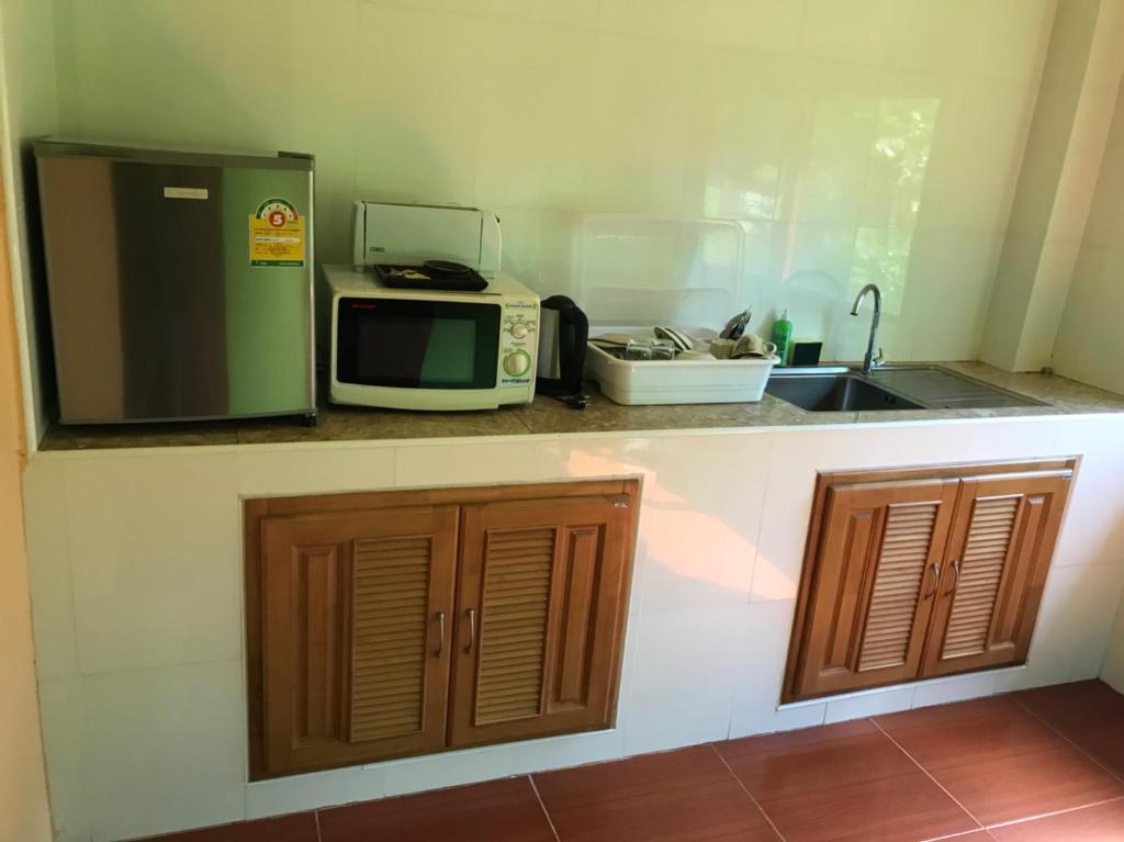 Kuchyň nebo kuchyňský kout v ubytování Green Villa