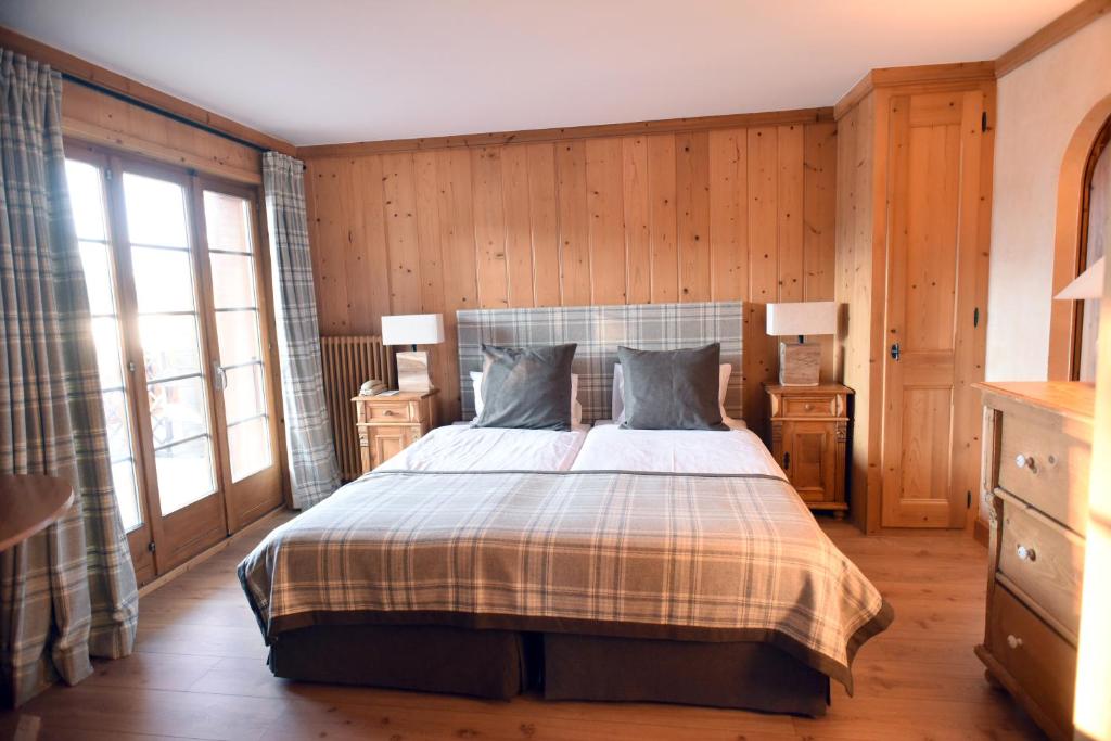 Postel nebo postele na pokoji v ubytování Chalet d'Adrien