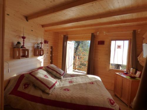 Cabane des K'Hauts Pinsにあるベッド