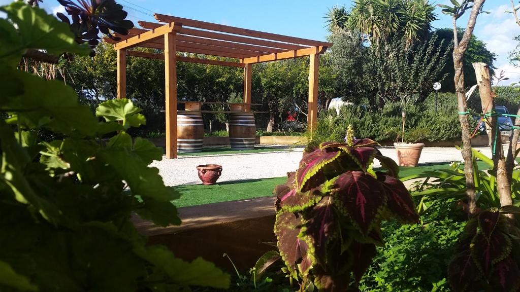 Vonkajšia záhrada v ubytovaní Baglio Cudia Resort