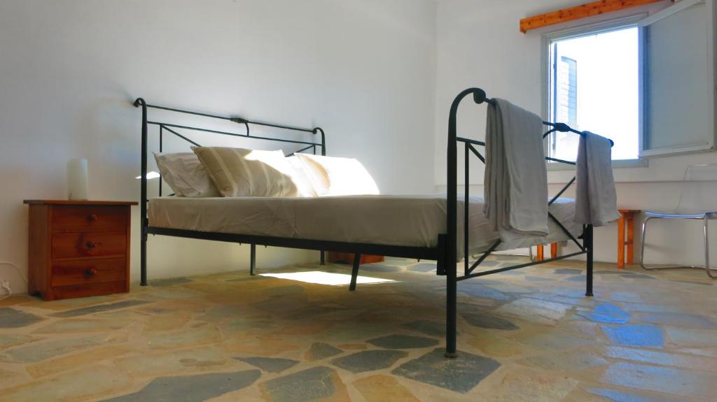 Postel nebo postele na pokoji v ubytování Lagada Beach Hotel