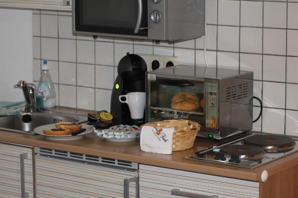 Kuchyň nebo kuchyňský kout v ubytování Appartementhaus Thermeneck