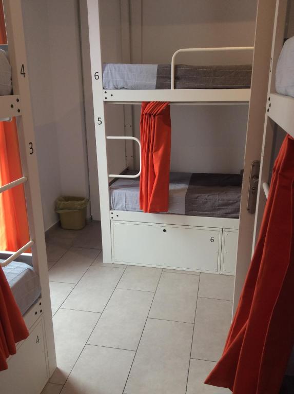 Postel nebo postele na pokoji v ubytování Hostelscat