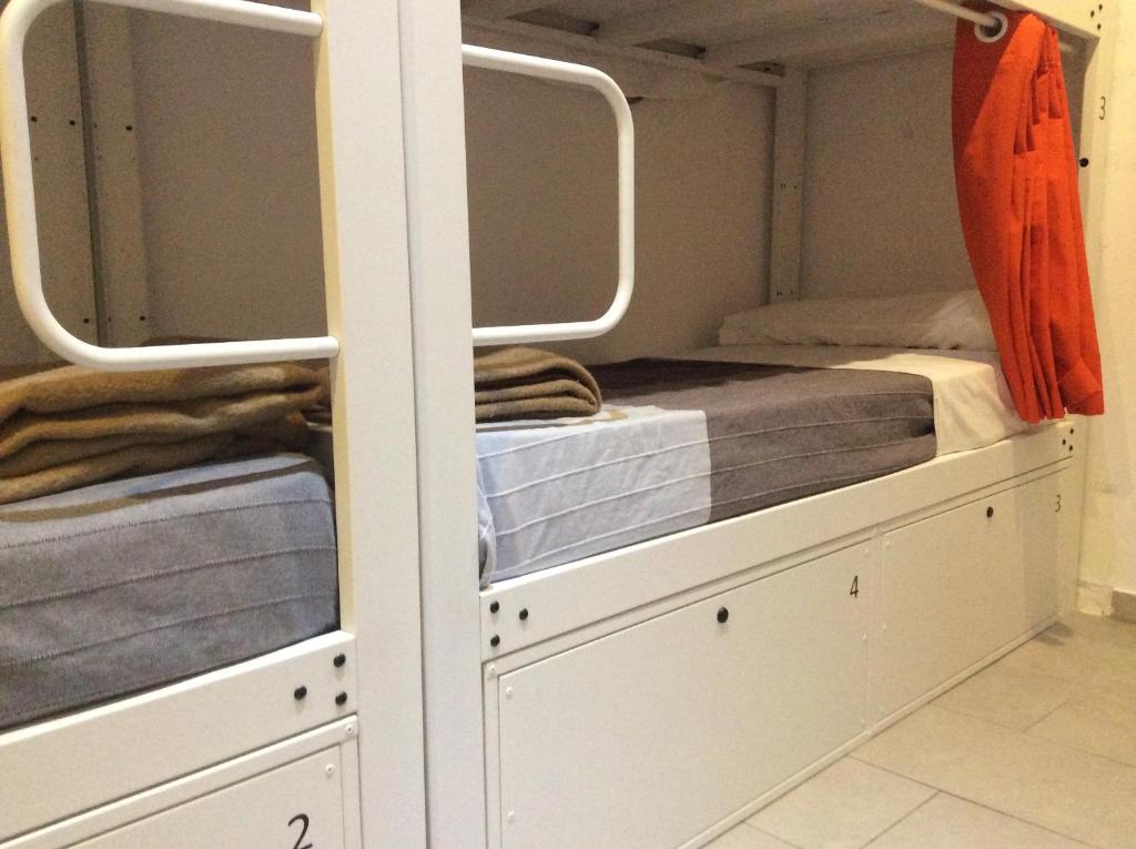 Postel nebo postele na pokoji v ubytování Hostelscat