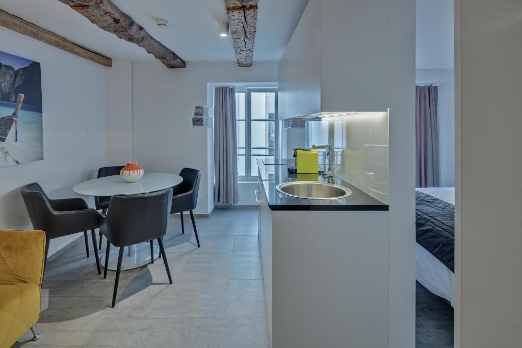 Postel nebo postele na pokoji v ubytování smartroom The Residence la Cittadella Baden