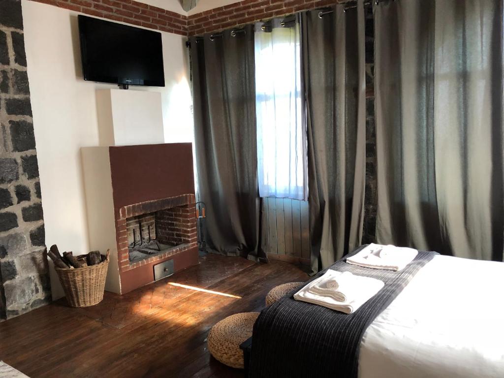 Postel nebo postele na pokoji v ubytování B&B Villa Loriana