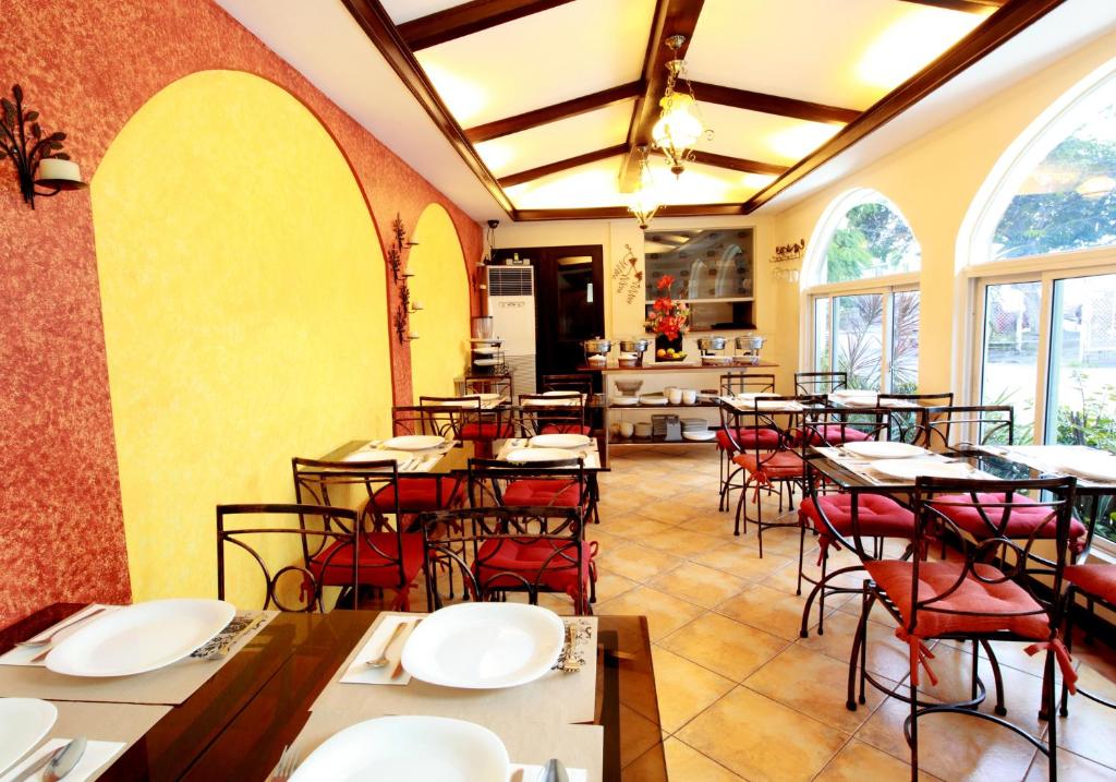 Restaurant o un lloc per menjar a The Suites at Calle Nueva