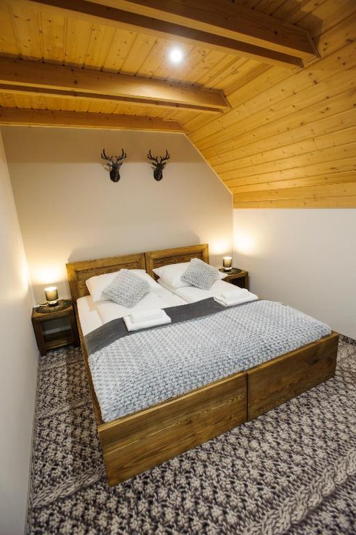 Postel nebo postele na pokoji v ubytování SMEREK 2