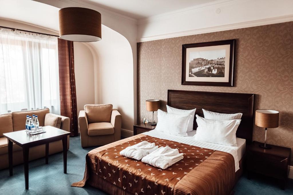 Cama o camas de una habitación en Chaika Hotel