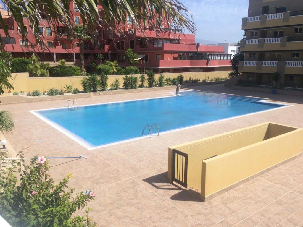 Bazén v ubytovaní Residencial La Perla alebo v jeho blízkosti