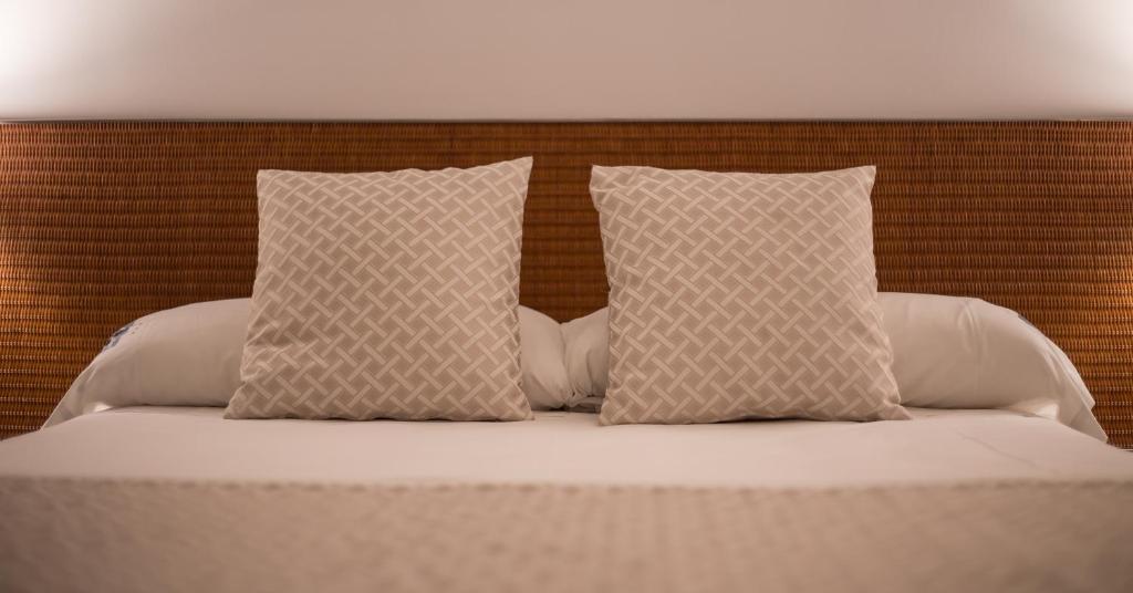 Cama o camas de una habitación en Carlos III