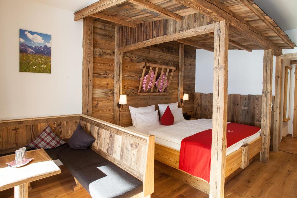 Postel nebo postele na pokoji v ubytování Gröbl-Alm