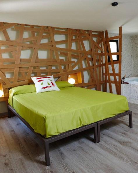 Posteľ alebo postele v izbe v ubytovaní Hotel Galería Essentia