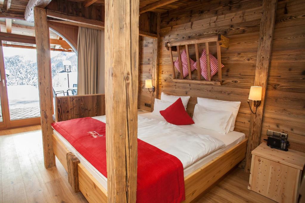Postel nebo postele na pokoji v ubytování Gröbl-Alm