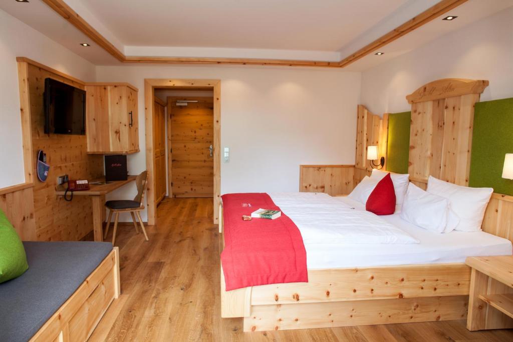 Postel nebo postele na pokoji v ubytování Gröbl-Alm