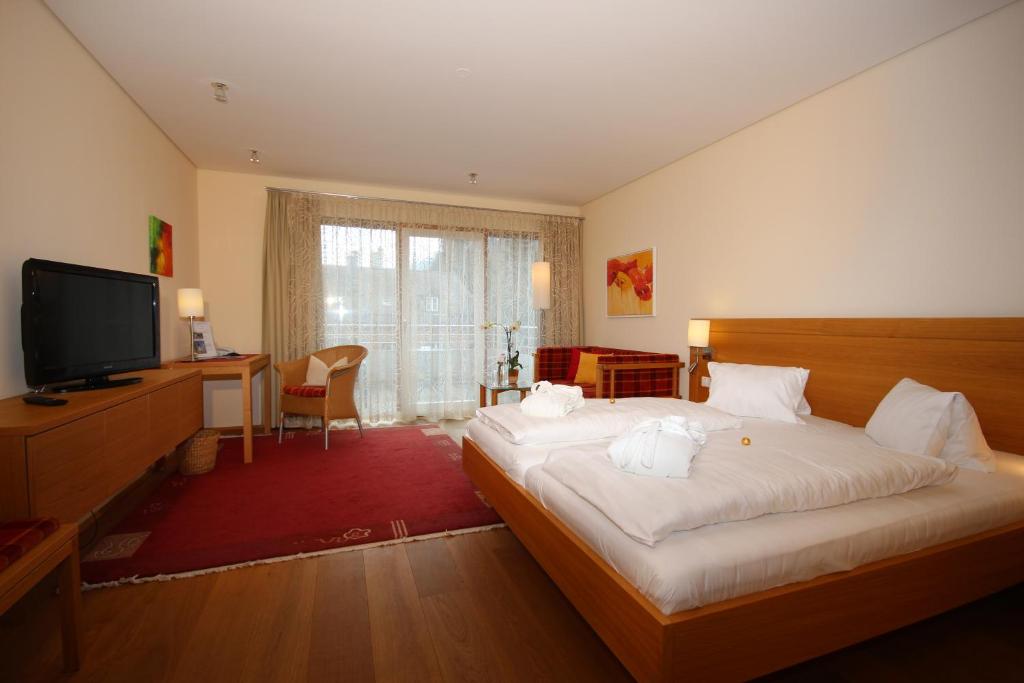 Postel nebo postele na pokoji v ubytování Hotel Hollweger