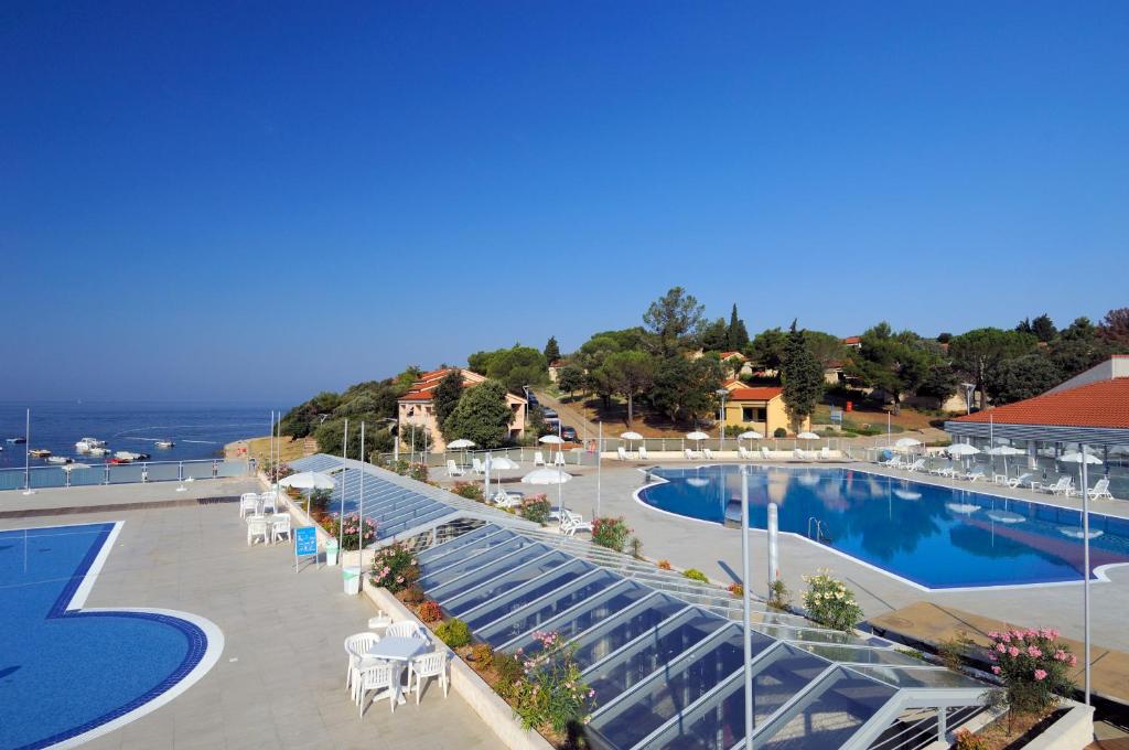 arial view of a swimming pool at a resort at Maistra Select Petalon Resort in Vrsar