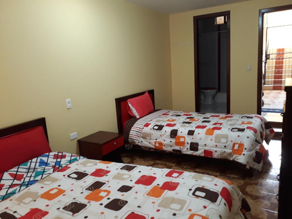 Postel nebo postele na pokoji v ubytování Hotel Navarra