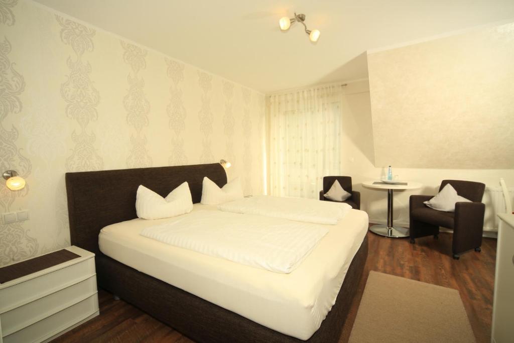 Postel nebo postele na pokoji v ubytování PIEPers Landidyll Hotel
