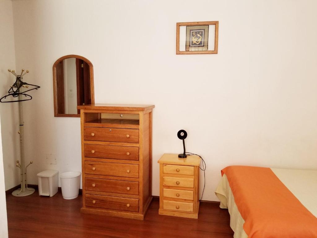 Postel nebo postele na pokoji v ubytování Heritage Inn