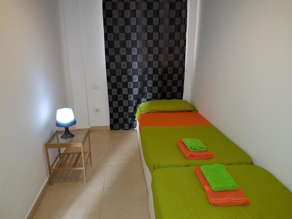 Posteľ alebo postele v izbe v ubytovaní Casa Natalia