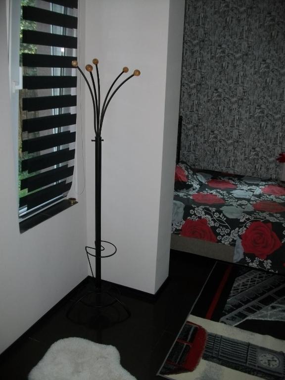 A bed or beds in a room at Black&Red Apartment