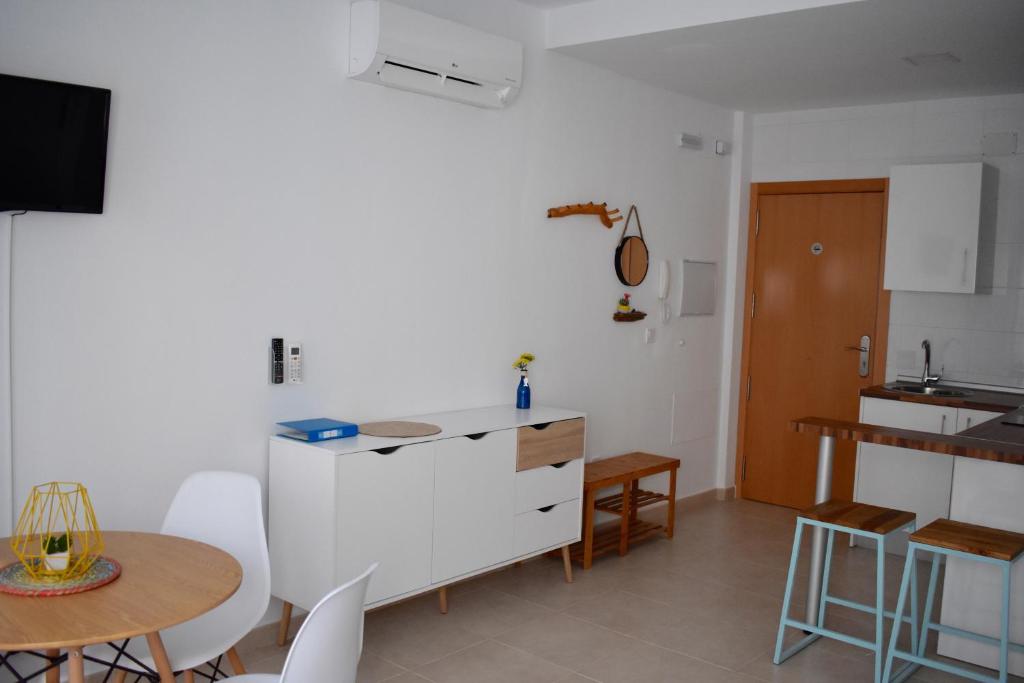 Televízia a/alebo spoločenská miestnosť v ubytovaní Casa Al Sur Apartments