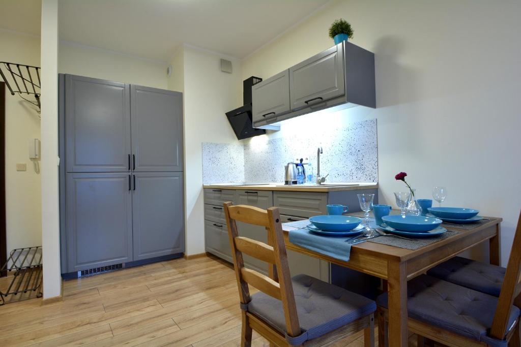 Kuchyňa alebo kuchynka v ubytovaní Apartament Bema 38