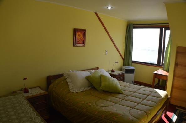 Postel nebo postele na pokoji v ubytování Los Gualles de la Candelaria Apart Hotel