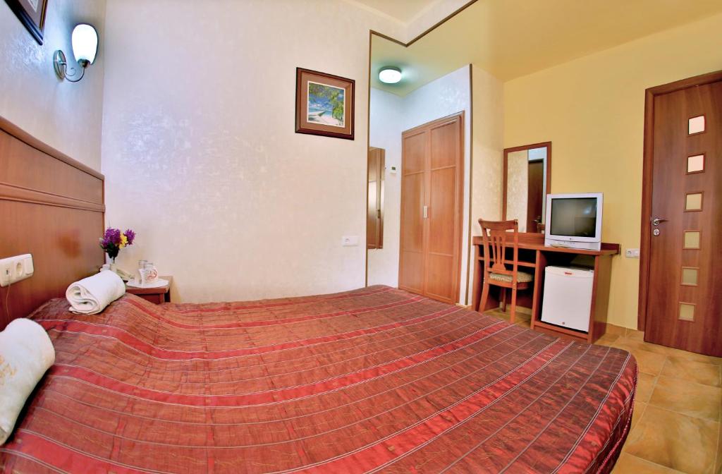 Postel nebo postele na pokoji v ubytování Hostel JUPITER