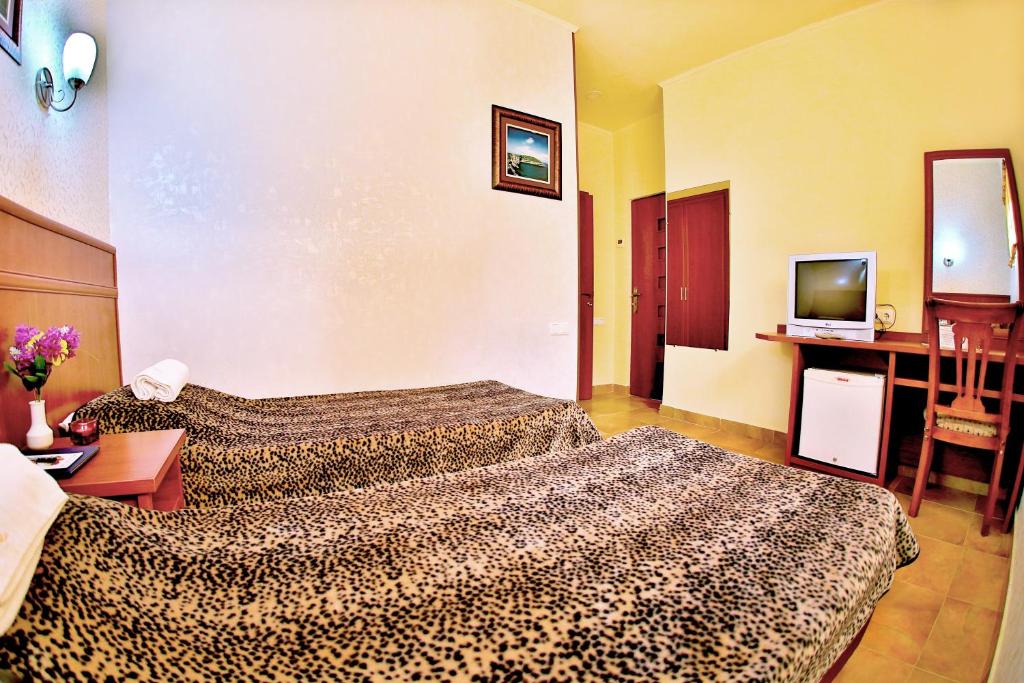 Postel nebo postele na pokoji v ubytování Hostel JUPITER