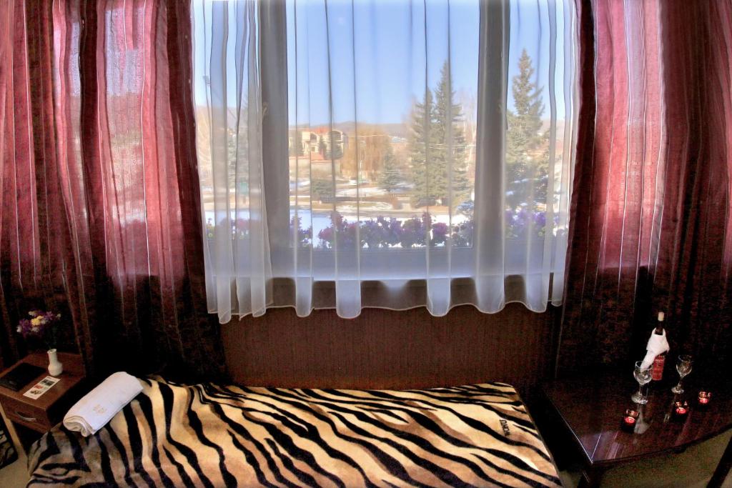 Postel nebo postele na pokoji v ubytování Hostel JUPITER