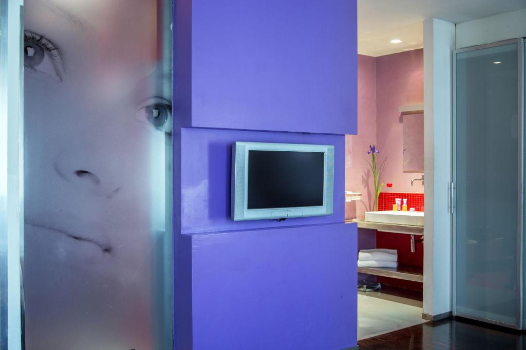 TV a/nebo společenská místnost v ubytování Hotel Ariston