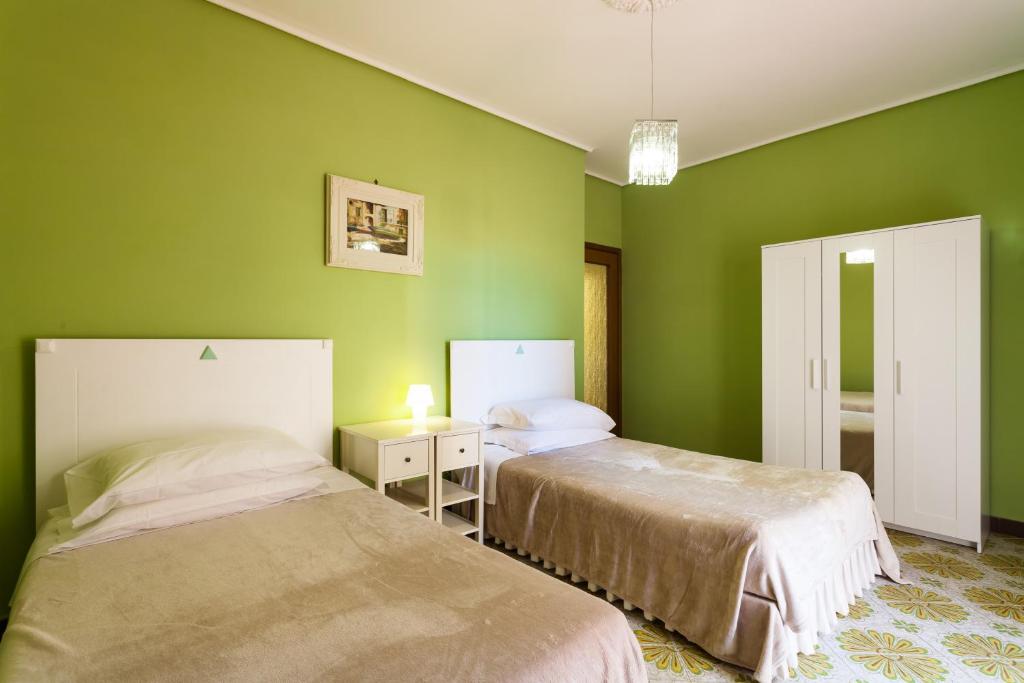 Posteľ alebo postele v izbe v ubytovaní Sorrento Central Flats
