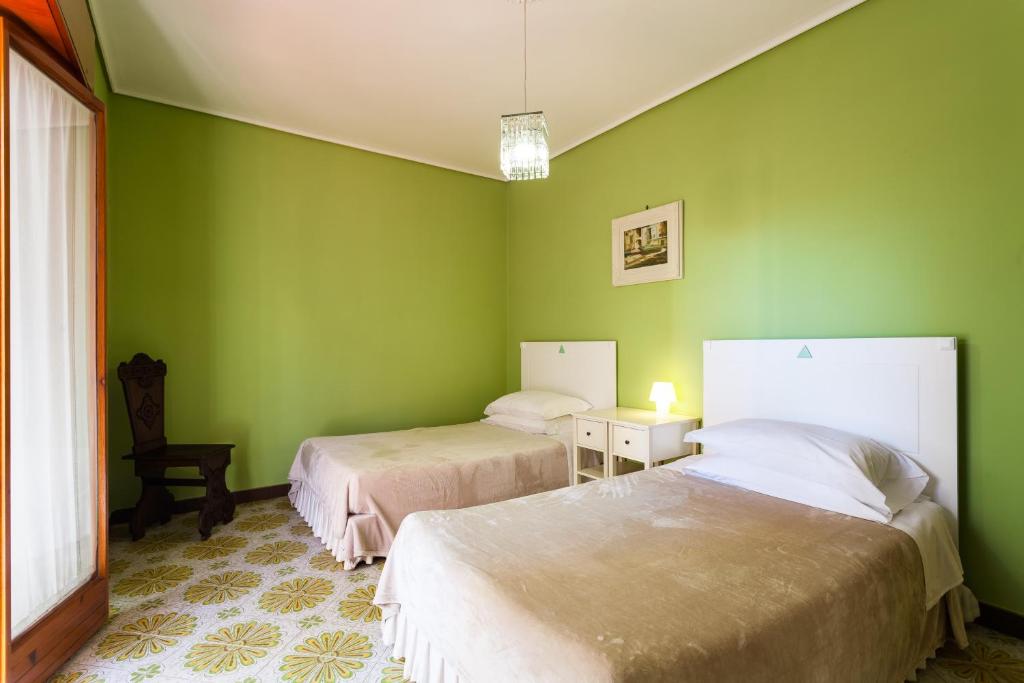 Posteľ alebo postele v izbe v ubytovaní Sorrento Central Flats