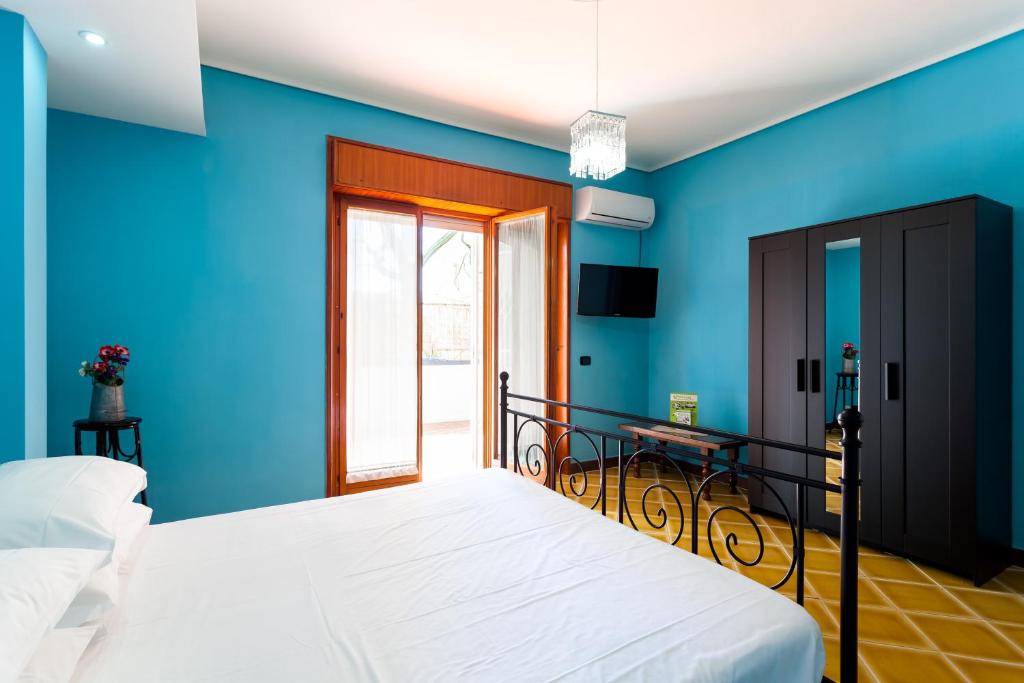 Posteľ alebo postele v izbe v ubytovaní Sorrento Central Flats