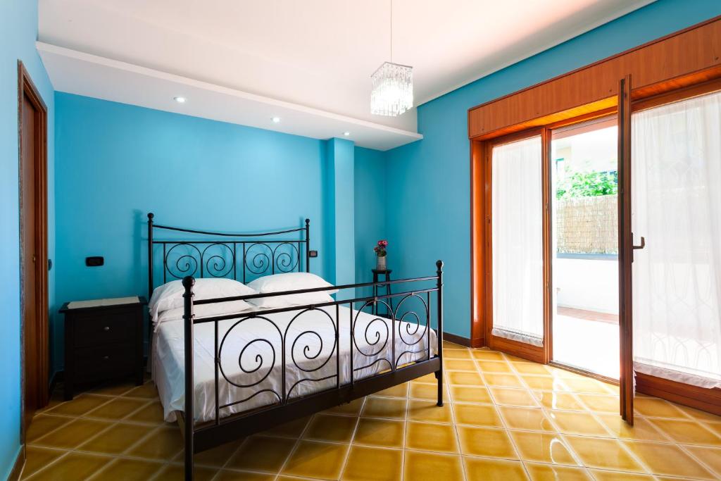 Posteľ alebo postele v izbe v ubytovaní Sorrento Central Flats