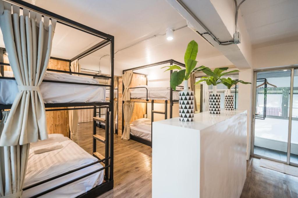 Postel nebo postele na pokoji v ubytování Your Space Hotel Prasingh
