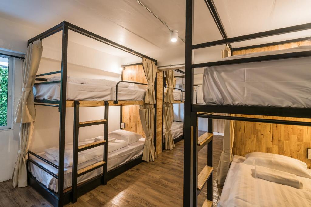 Postel nebo postele na pokoji v ubytování Your Space Hotel Prasingh