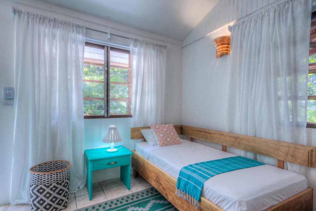 Postel nebo postele na pokoji v ubytování Hotel Guiones