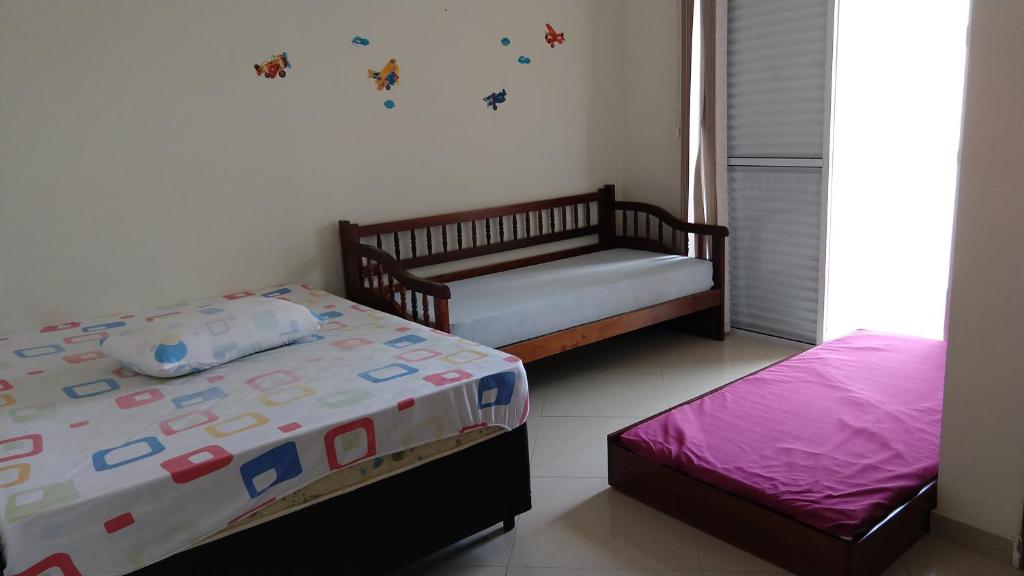  Casa Praia Grande - Guilhermina- 2 suítes com ar condicionado