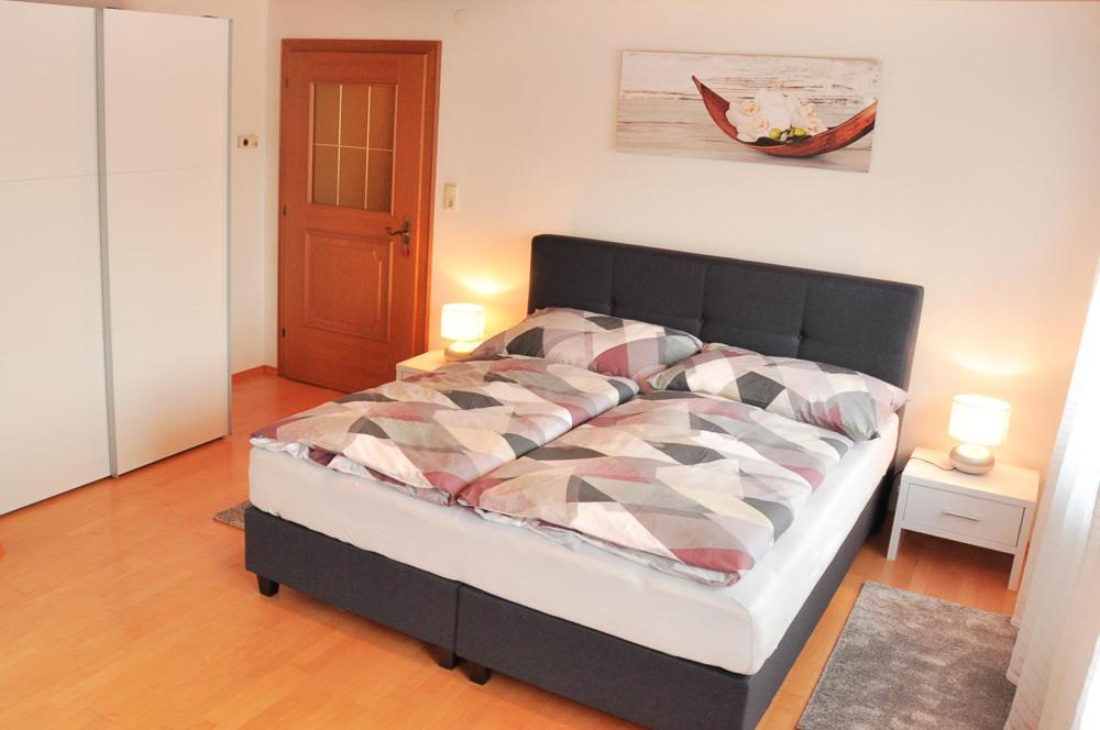 Postel nebo postele na pokoji v ubytování Ferienwohnung Vera
