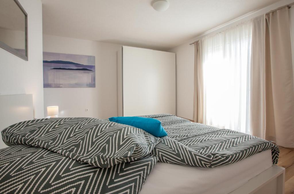Postel nebo postele na pokoji v ubytování Apartment Penthouse Mak