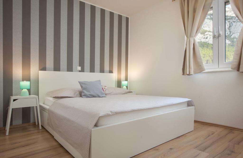 Postel nebo postele na pokoji v ubytování Apartment Penthouse Mak