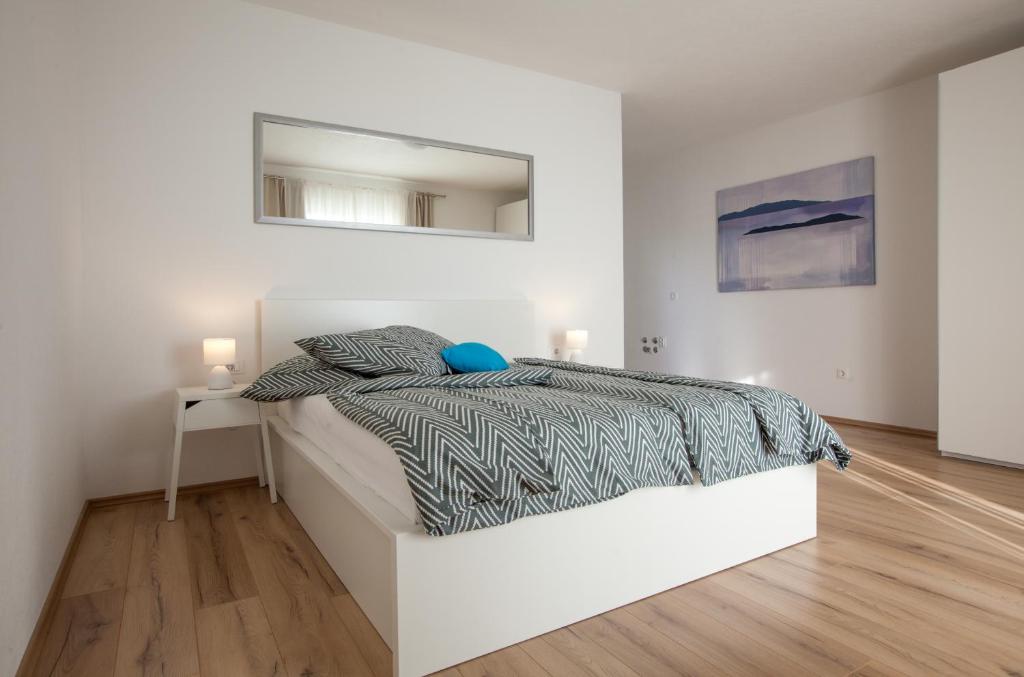 Postel nebo postele na pokoji v ubytování Apartment Penthouse Mak