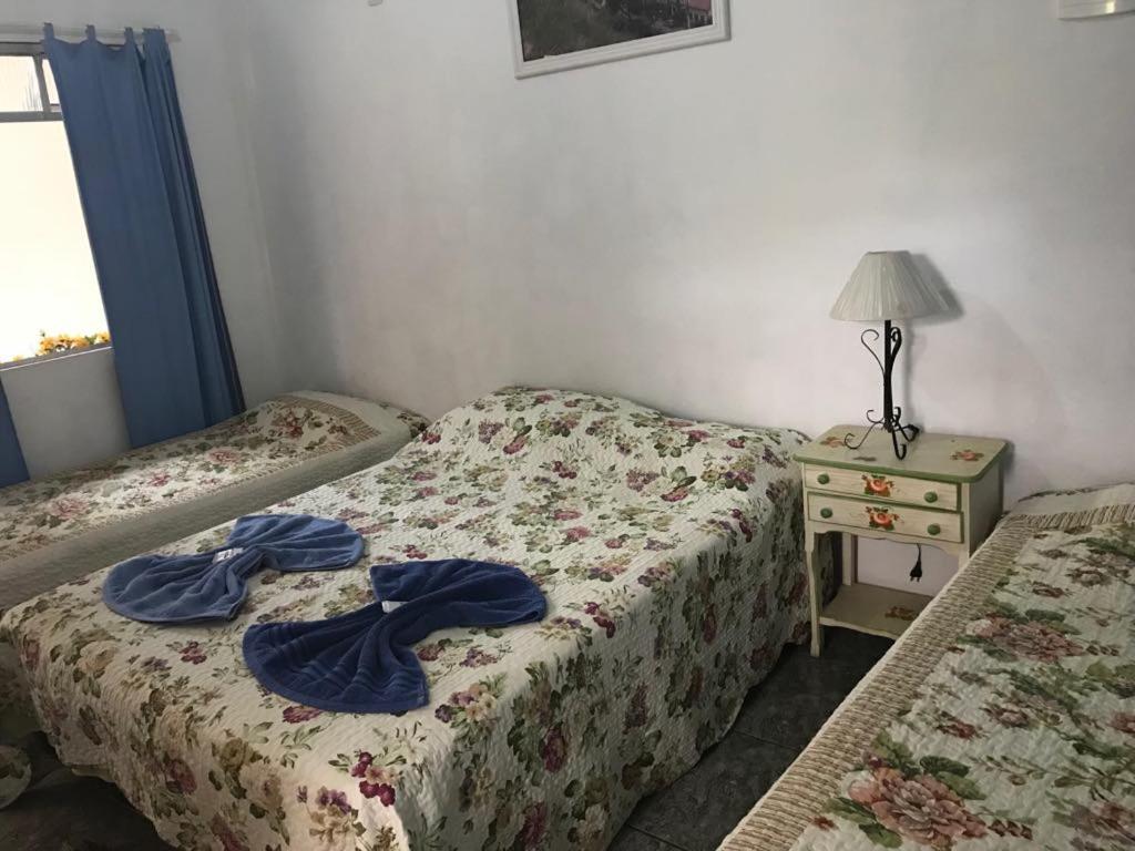 Un pat sau paturi într-o cameră la Pousada Chuá Chuá